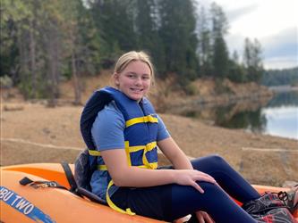 Student Sitting in Kayak